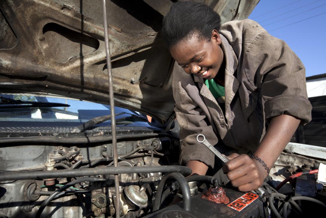 African-woman-working-on-car-ONE-TIME-USE-ONLY-FOR-WP1658