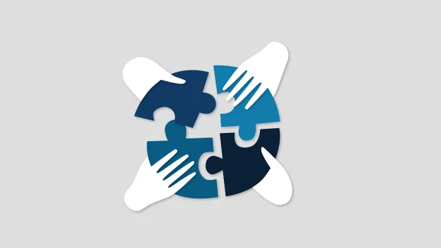 A circle split into four puzzle pieces