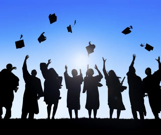 Group Of Diverse Students Celebrating Graduation