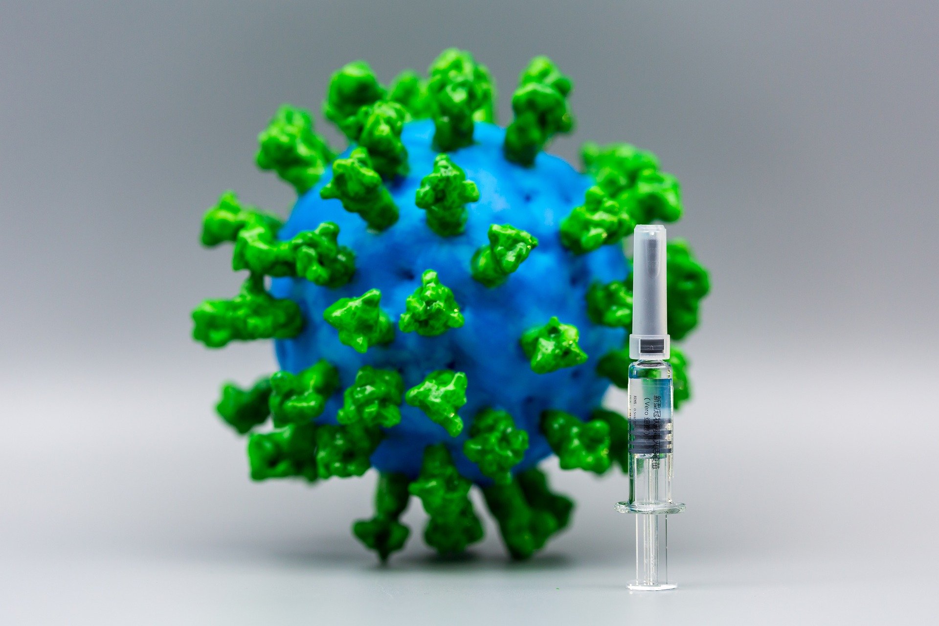 Virus-as-a-globe-with-vaccine