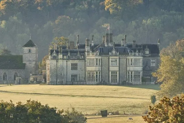 Wiston House with autumnal trees