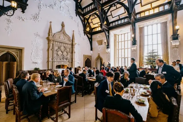 Participants dining in the Great Hall at Wiston House