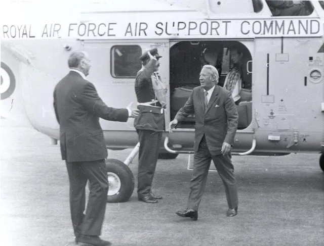 Edward Heath disembarks a helicopter.
