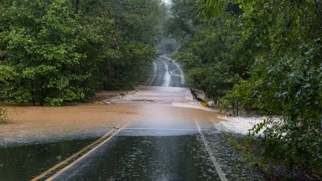 An image of a flooded road used to demonstrate the impact of climate change