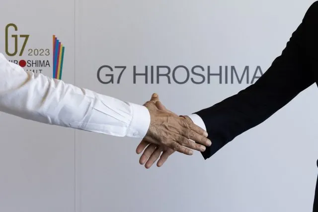 21/05/2023. Hiroshima, Japan. Prime Minister Rishi Sunak meets Indian Prime Minister Narendra Modi as he attends the G7 Summit in Japan.
