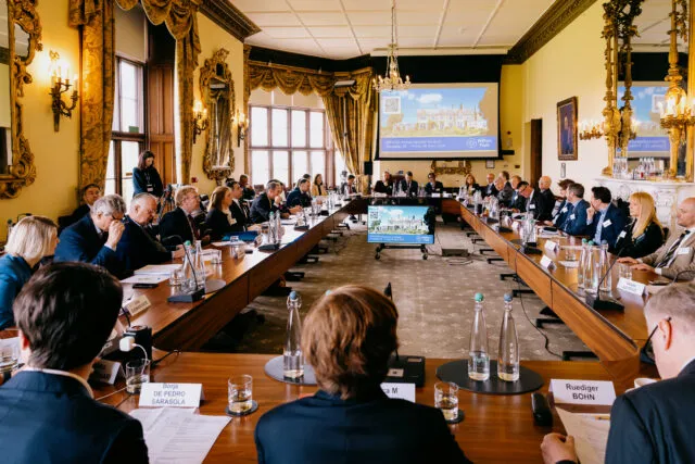 Participants at the Ambassadorial Summit 2024 seated round the conference table
