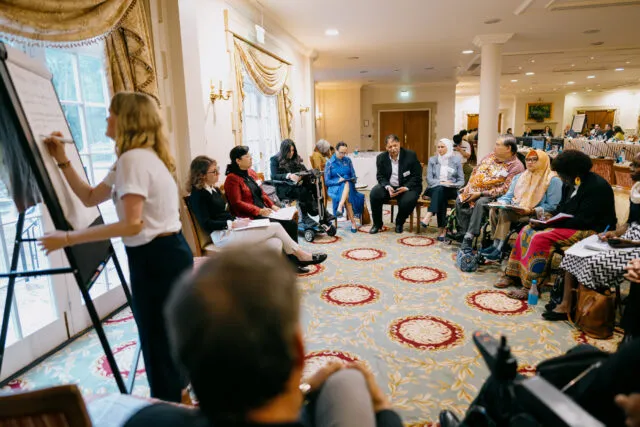 Participants gather for a breakout group