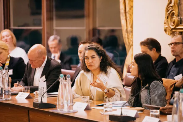 Ana María Rodriguez Valencia, Director of the Colombian Commission of Jurists, speaks at the conference table