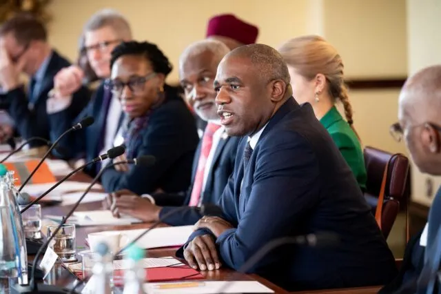 UK Foreign Secretary David Lammy speaks at the Wilton Park conference table