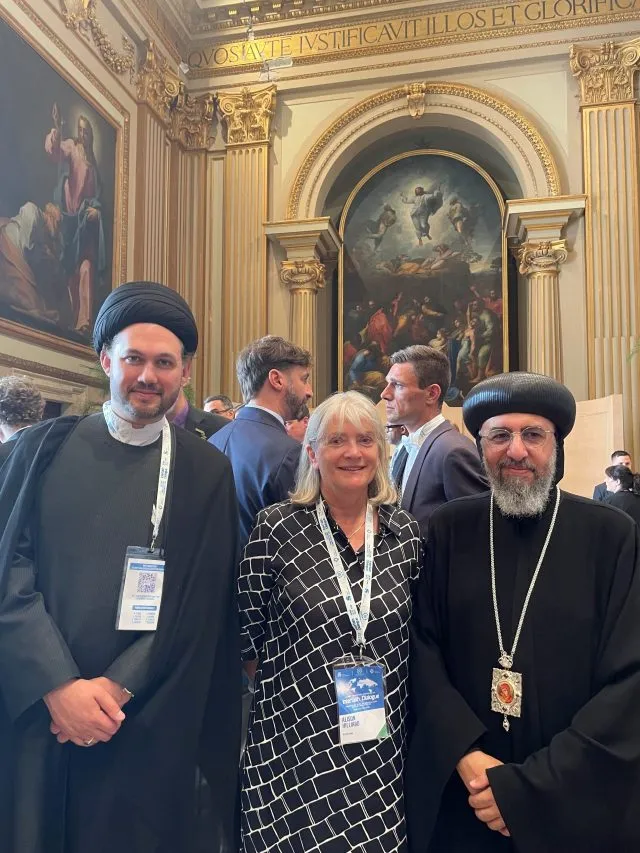 Alison Hilliard with two participants at the interfaith dialogue held at the Italian parliament