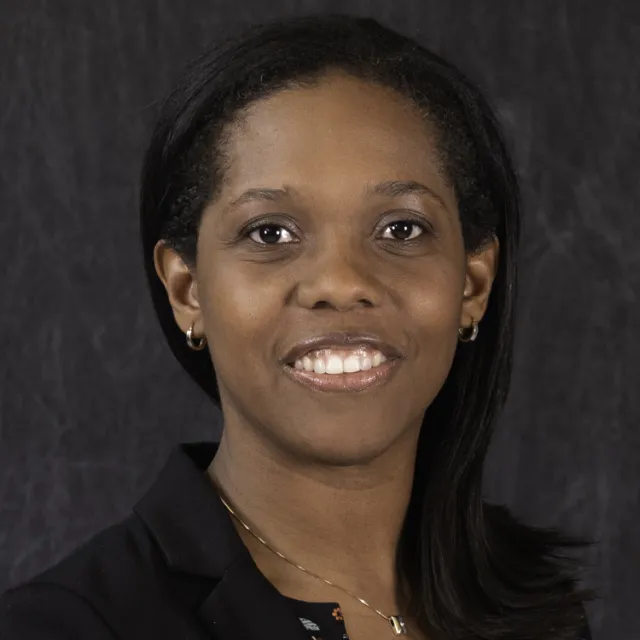 Kerry-Ann Barrett, Chief of the Cybersecurity Section with the Inter-American Committee Against Terrorism of the Organization of American States, smiling at the camera.