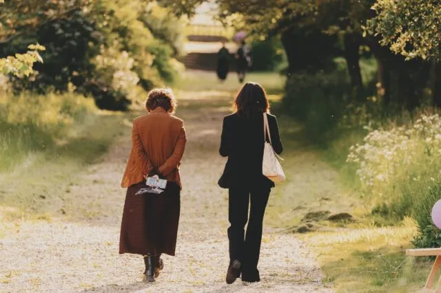 Participants wander in the grounds of Wilton Park.