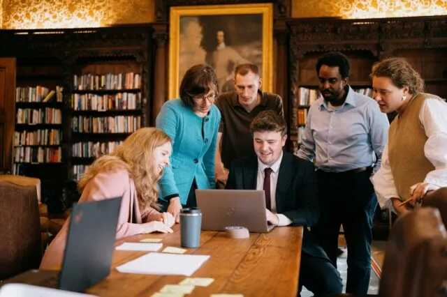 Members of the WIlton Park policy team gathered round a table