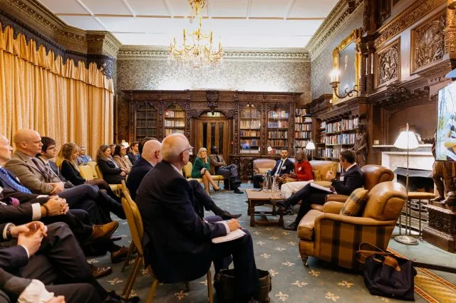 Guests gathered for a fireside chat