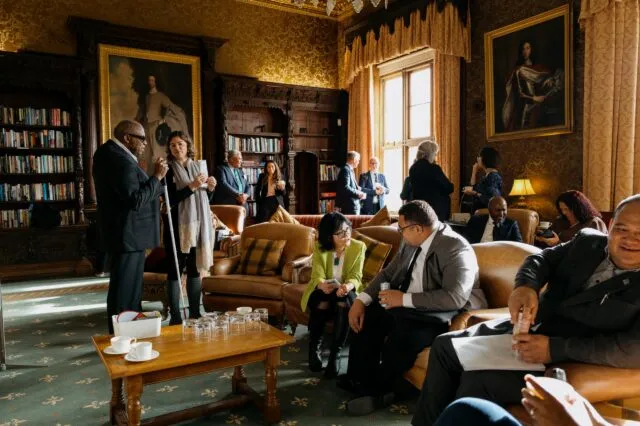 Participants take tea and coffee in the Library