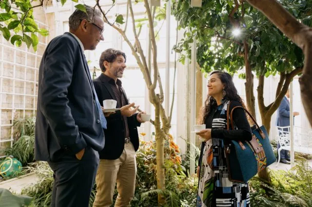 Participants in discussion in the Orangery