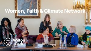 Members of the Women, Faith and Climate network gathered at a table