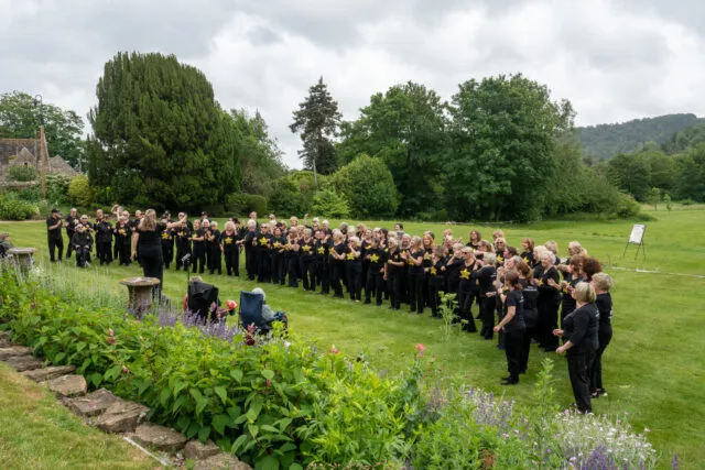 The West Sussex Rock Choir perform in the grounds of Wiston House