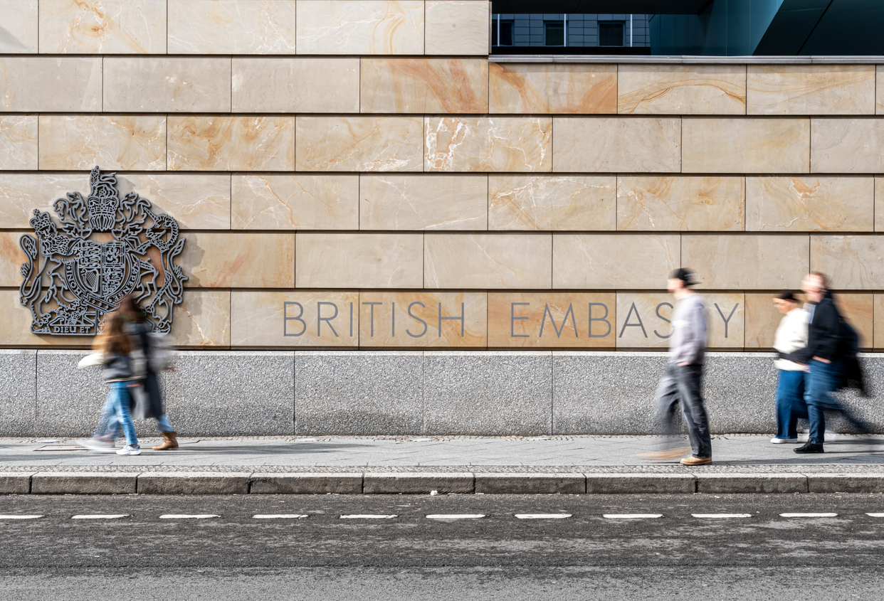 People on the street in front of the British Embassy